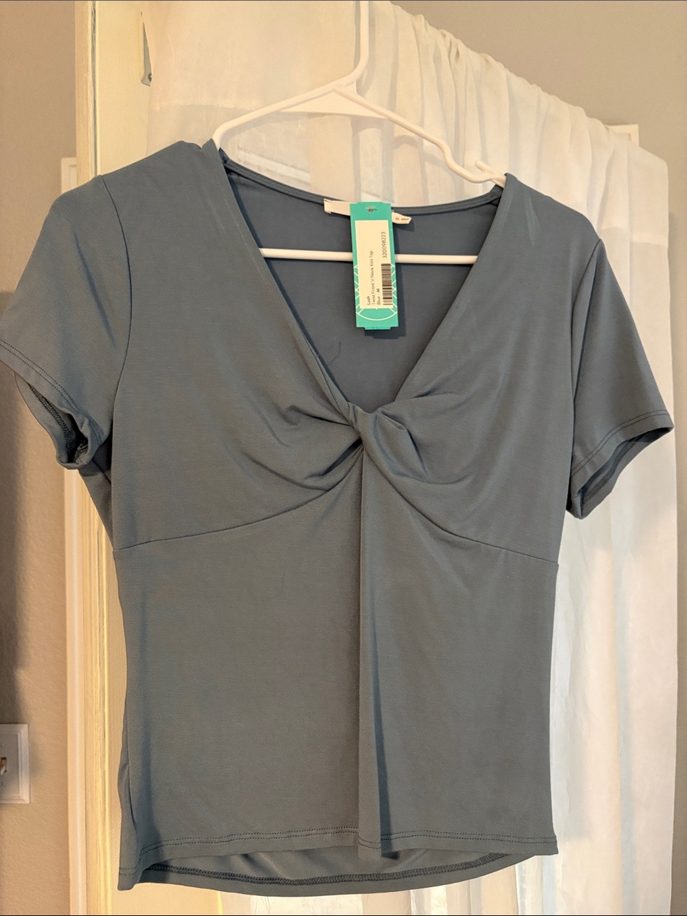 Lush twist front v neck knit top Women’s Twisted Front V-Neck Top - Steel Blue